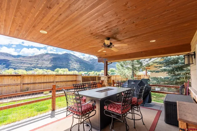 a view of house with yard