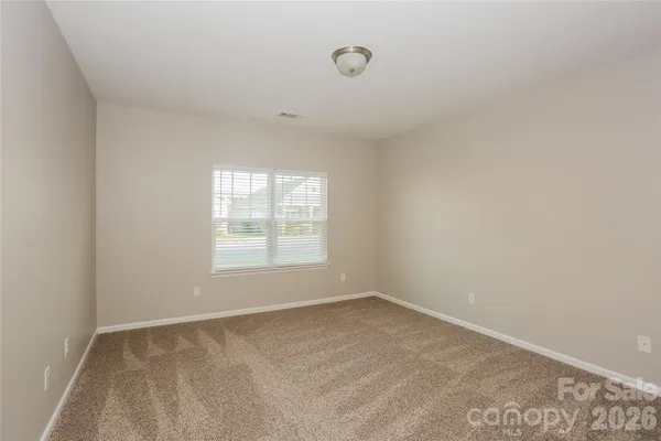a view of an empty room with window