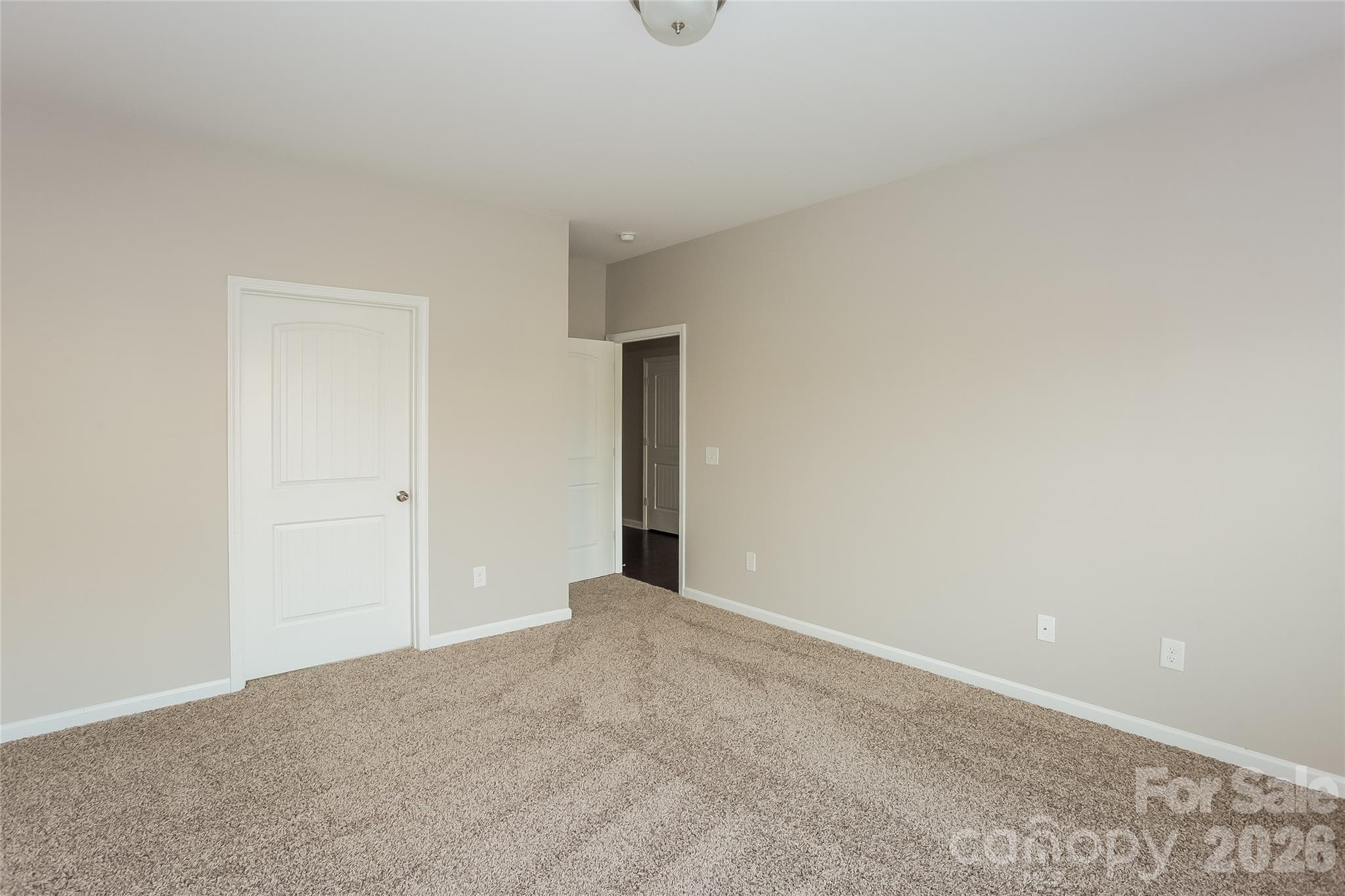 288 Harrison Lane Locust, NC 28097 - Photo 13 of 15 a view of an empty room with window