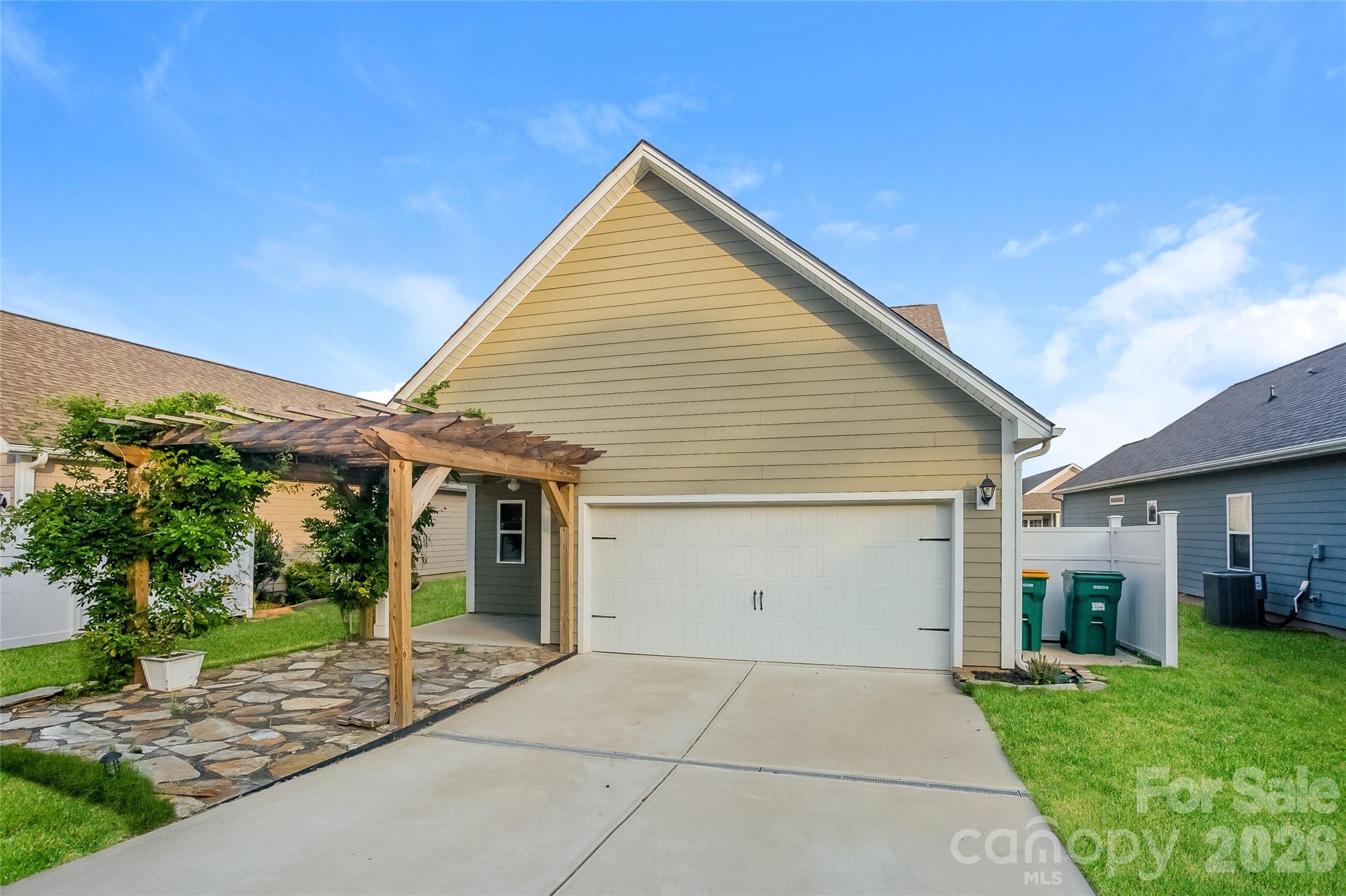 288 Harrison Lane Locust, NC 28097 - Photo 15 of 15 a view of a house with a yard