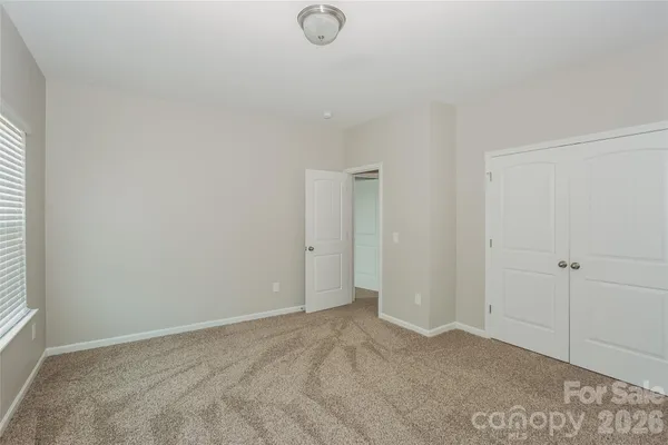 a bathroom with a sink vanity and a mirror