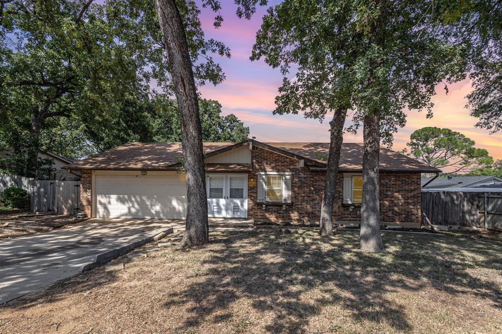 a backyard of a house with lots of green space