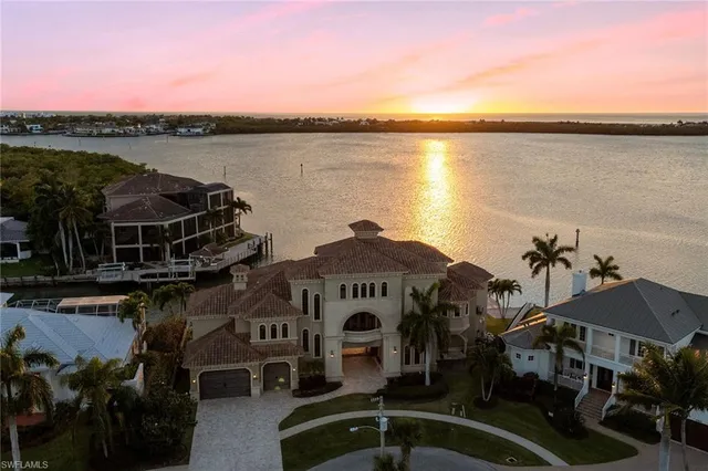 a front view of a house with lake view