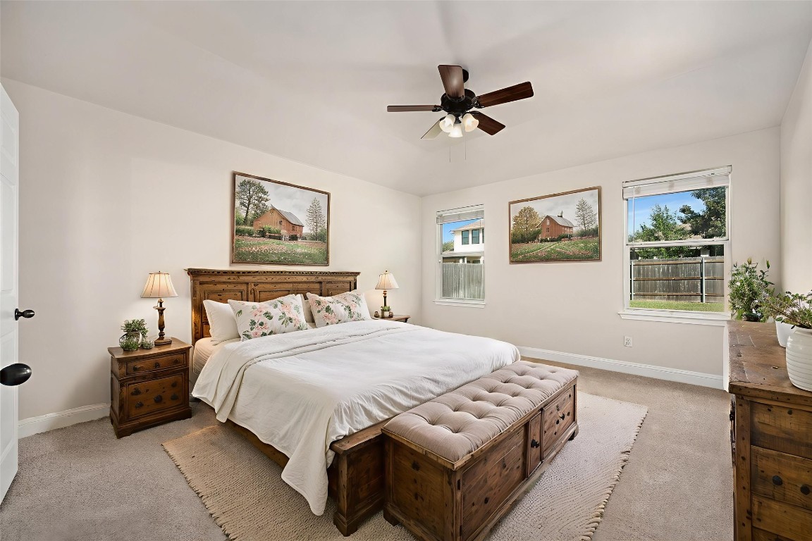 7817 Squirrel Hollow Drive Georgetown, TX 78628 - Photo 17 of 28 This photo shows virtual staging of the home's primary bedroom.