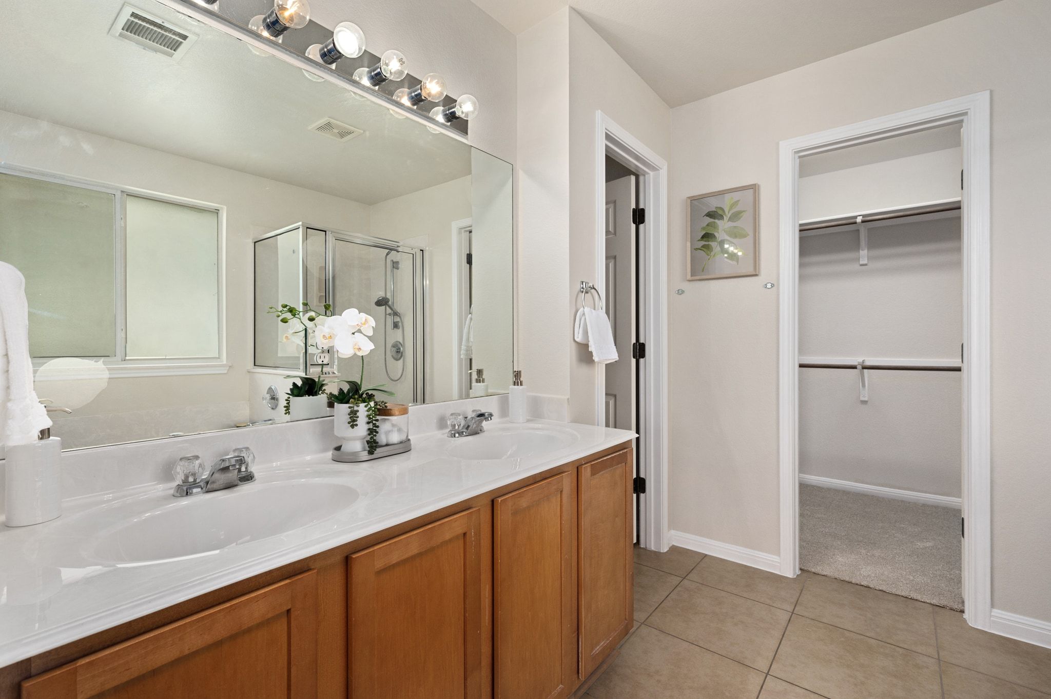 7817 Squirrel Hollow Drive Georgetown, TX 78628 - Photo 19 of 28 a bathroom with a sink and a mirror