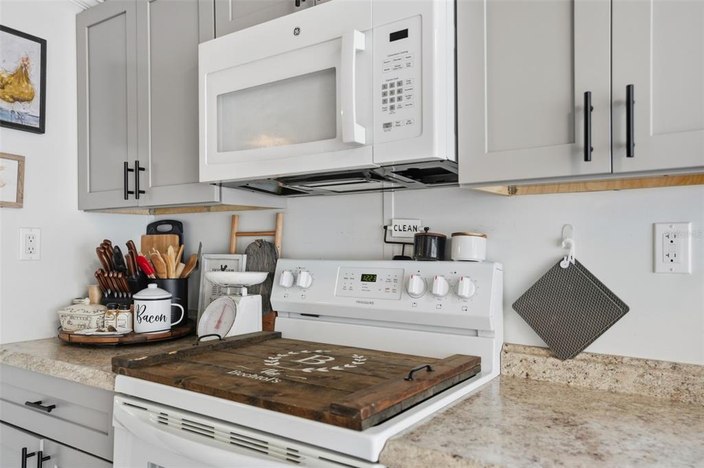 17539 Edwin Terrace Hudson, FL 34667 - Photo 16 of 38 a stove top oven sitting inside of a kitchen