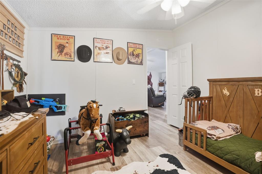 17539 Edwin Terrace Hudson, FL 34667 - Photo 25 of 38 a view of a workspace with furniture and toys