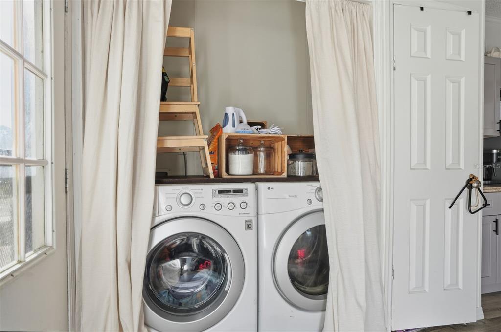 17539 Edwin Terrace Hudson, FL 34667 - Photo 31 of 38 a utility room with dryer and washer