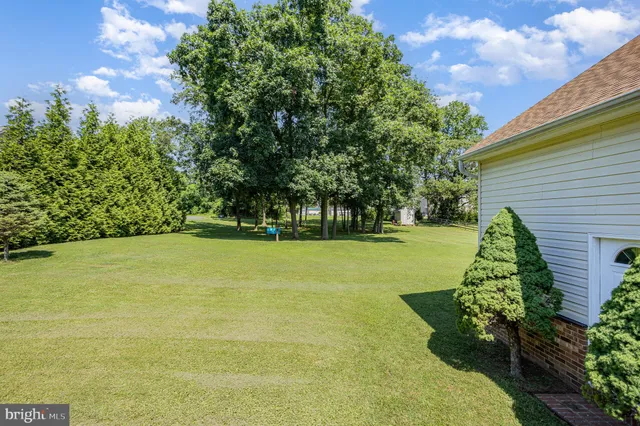 a view of outdoor space swimming pool and green space