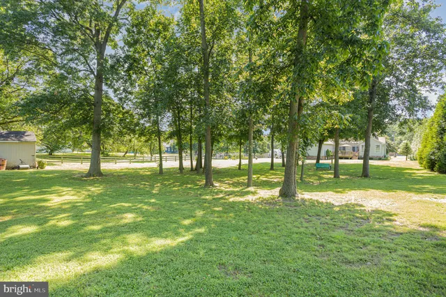 a view of a house with a big yard