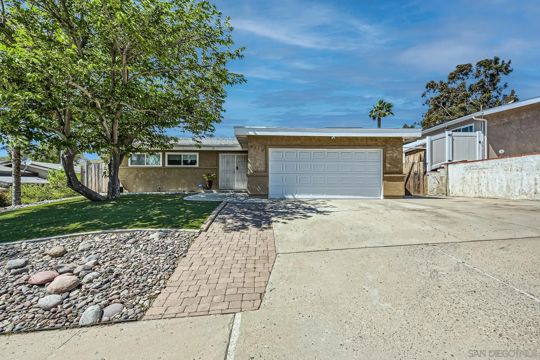 8510 Rumson Drive Santee, CA 92071 - Photo 1 of 26 front view of a house with a yard