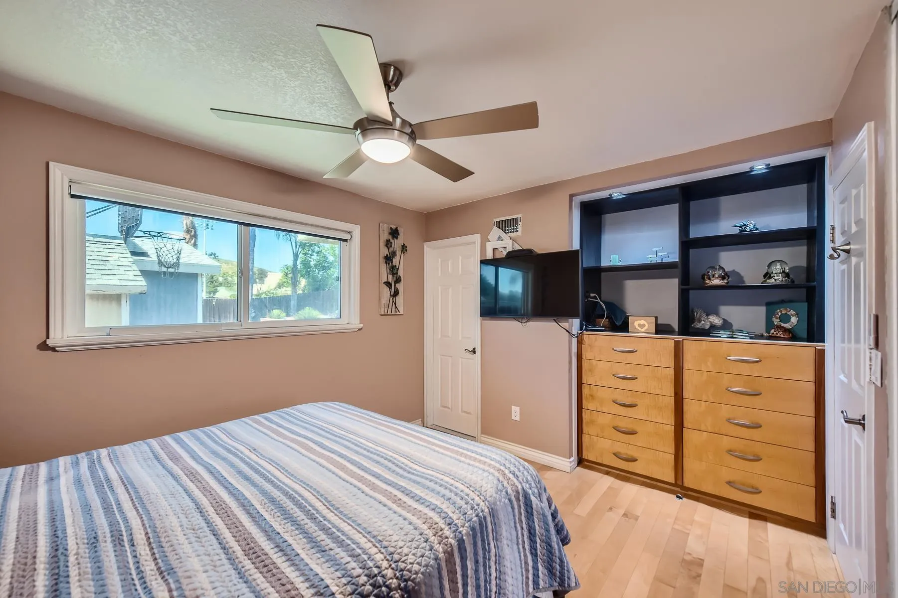 8510 Rumson Drive Santee, CA 92071 - Photo 16 of 26 a bedroom with a bed and a dresser