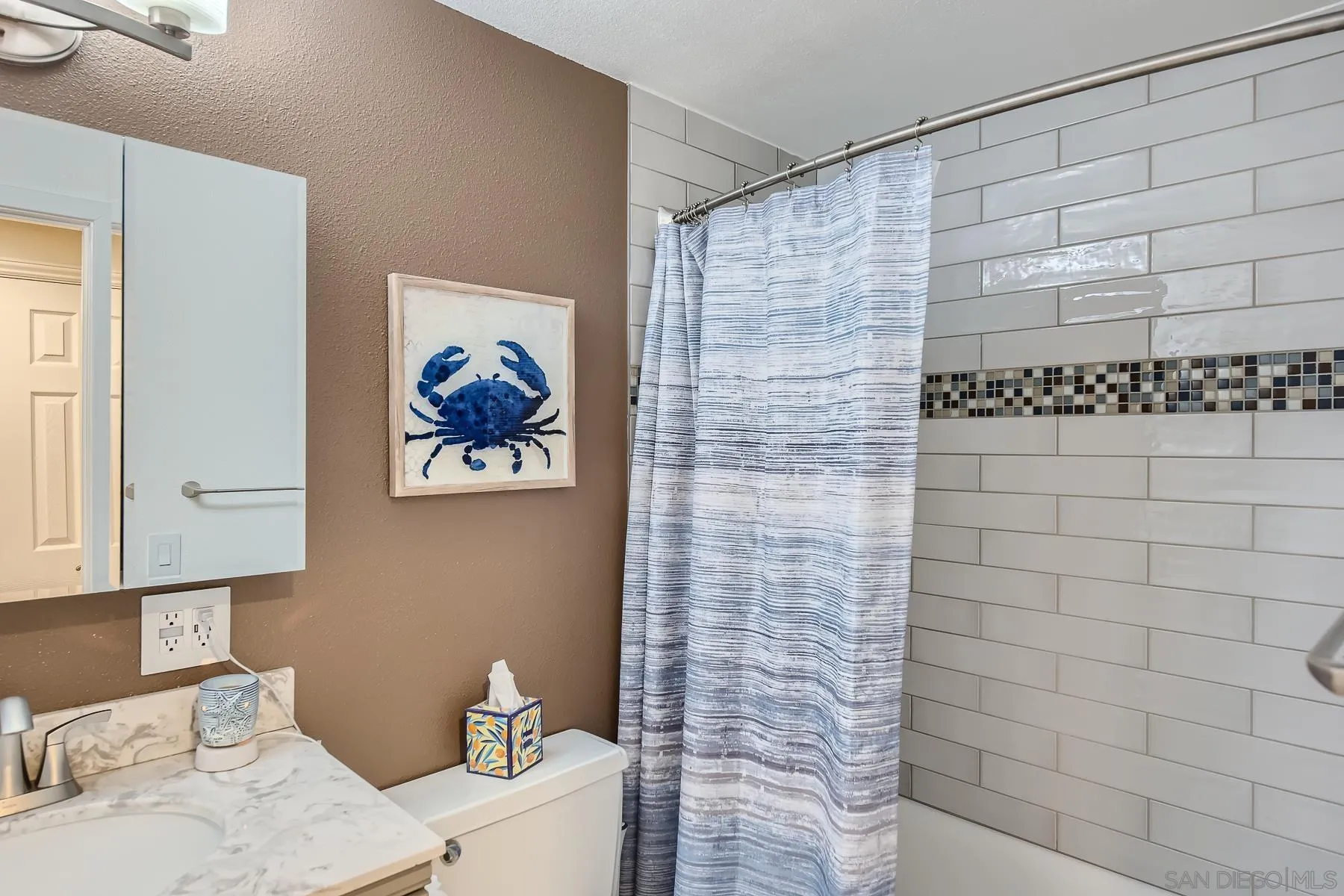 8510 Rumson Drive Santee, CA 92071 - Photo 21 of 26 a bathroom with a bathtub and a shower