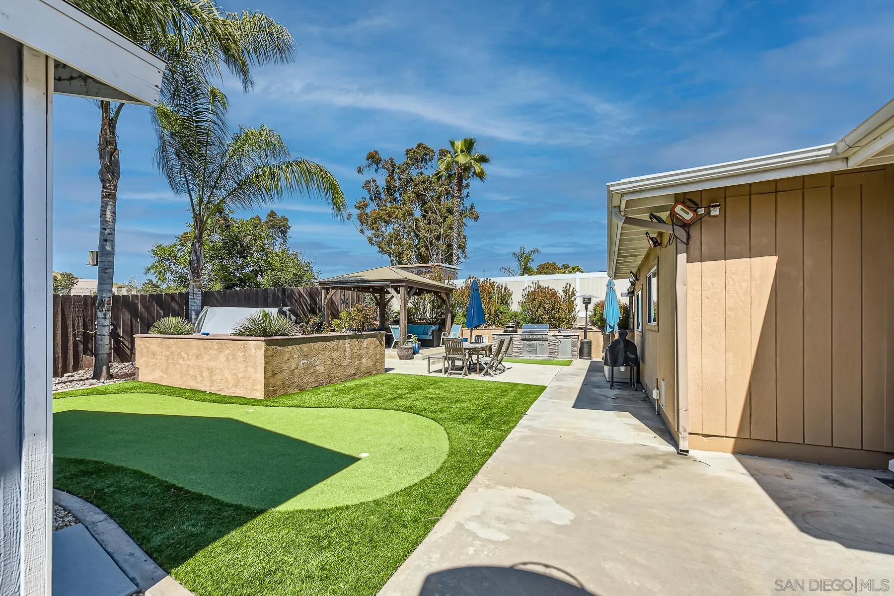 8510 Rumson Drive Santee, CA 92071 - Photo 24 of 26 a view of a house with backyard