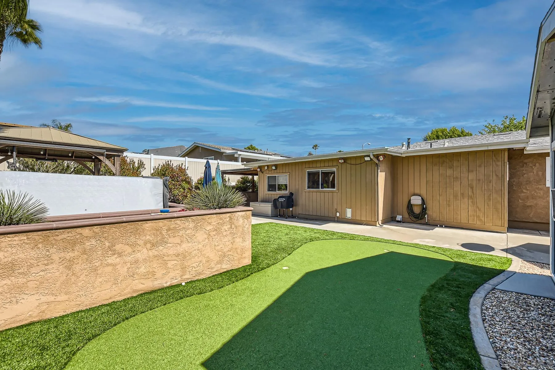 8510 Rumson Drive Santee, CA 92071 - Photo 25 of 26 a view of an house with backyard space and balcony