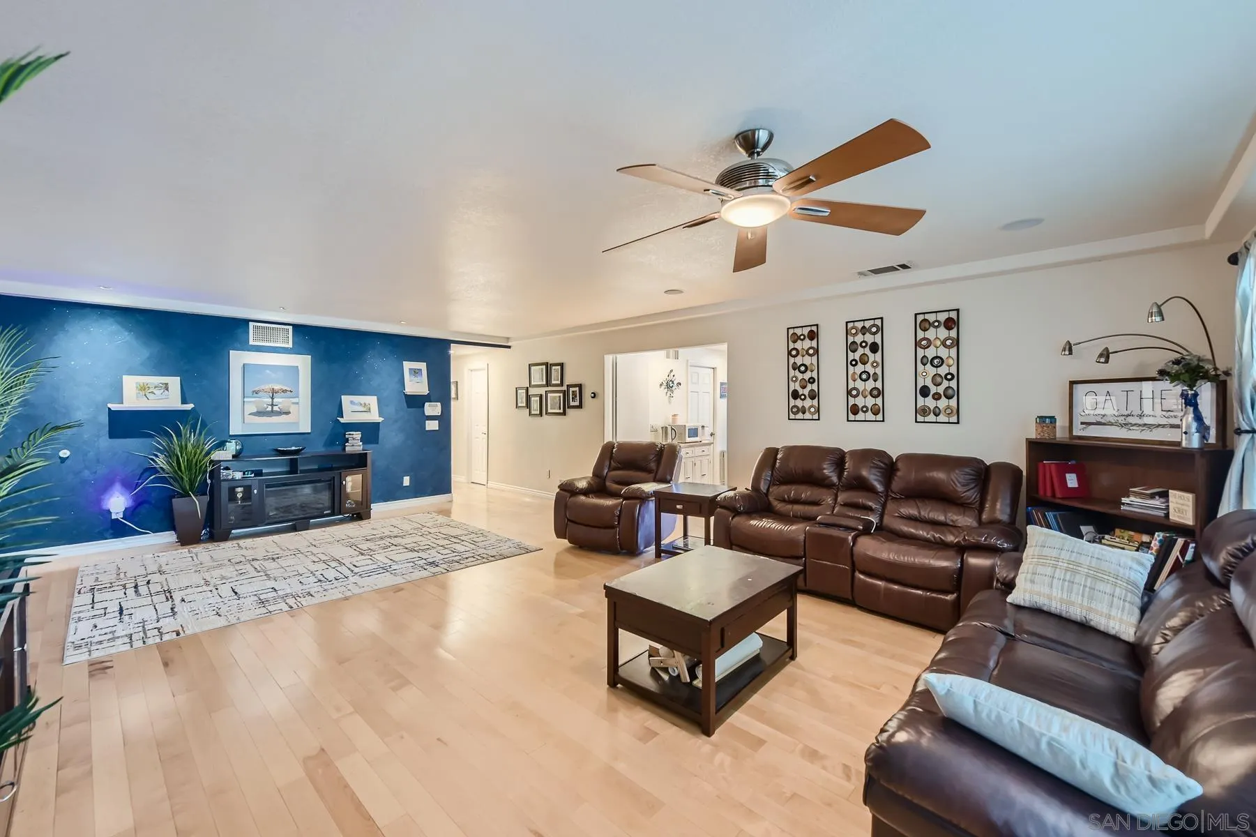 8510 Rumson Drive Santee, CA 92071 - Photo 4 of 26 a living room with furniture ceiling fan and a rug