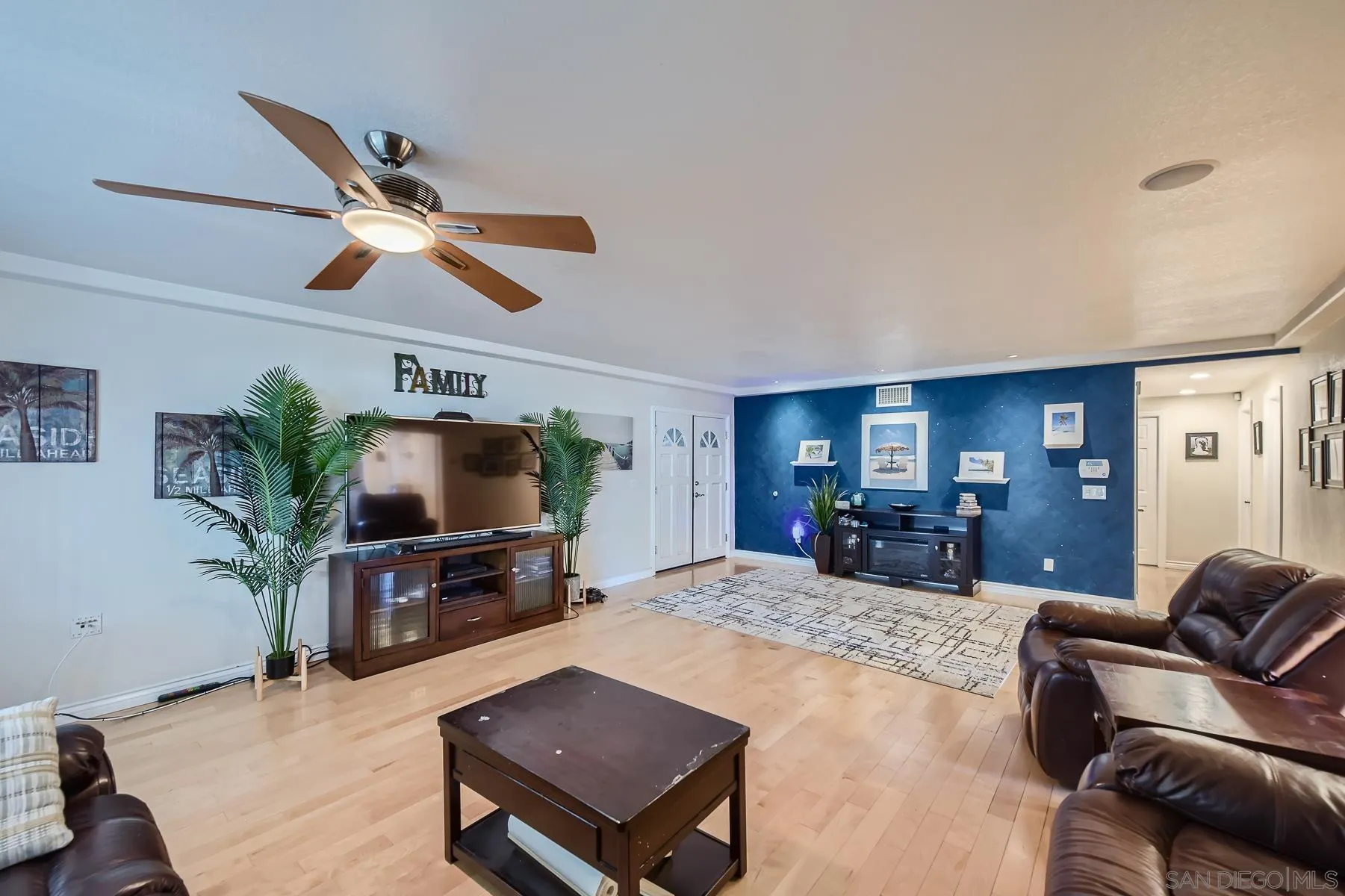 8510 Rumson Drive Santee, CA 92071 - Photo 8 of 26 a living room with furniture and a flat screen tv