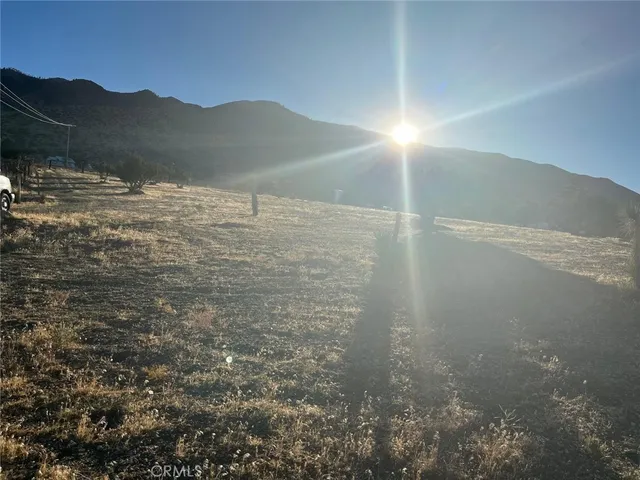 a view of a lake with a mountain in the background