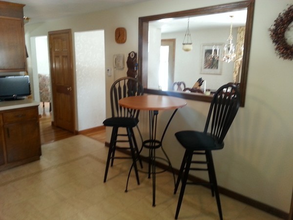 5 Governor Carver Road Billerica, MA 01821 - Photo 8 of 27 a view of a dining room with furniture and a chandelier