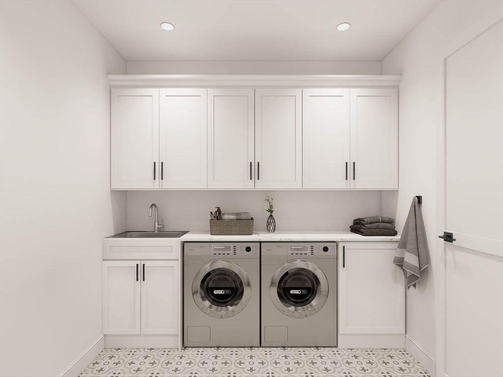11 Whitman Circle, Unit 11 Bellingham, MA 02019 - Photo 12 of 19 a utility room with sink dryer and washer