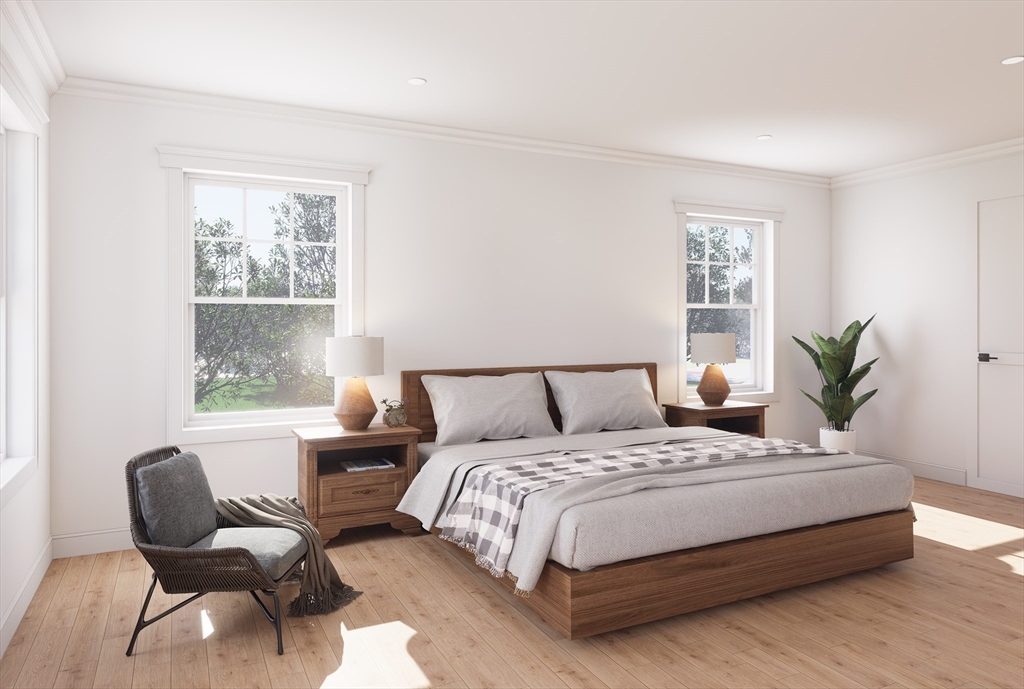 11 Whitman Circle, Unit 11 Bellingham, MA 02019 - Photo 13 of 19 a bedroom with a bed and a window