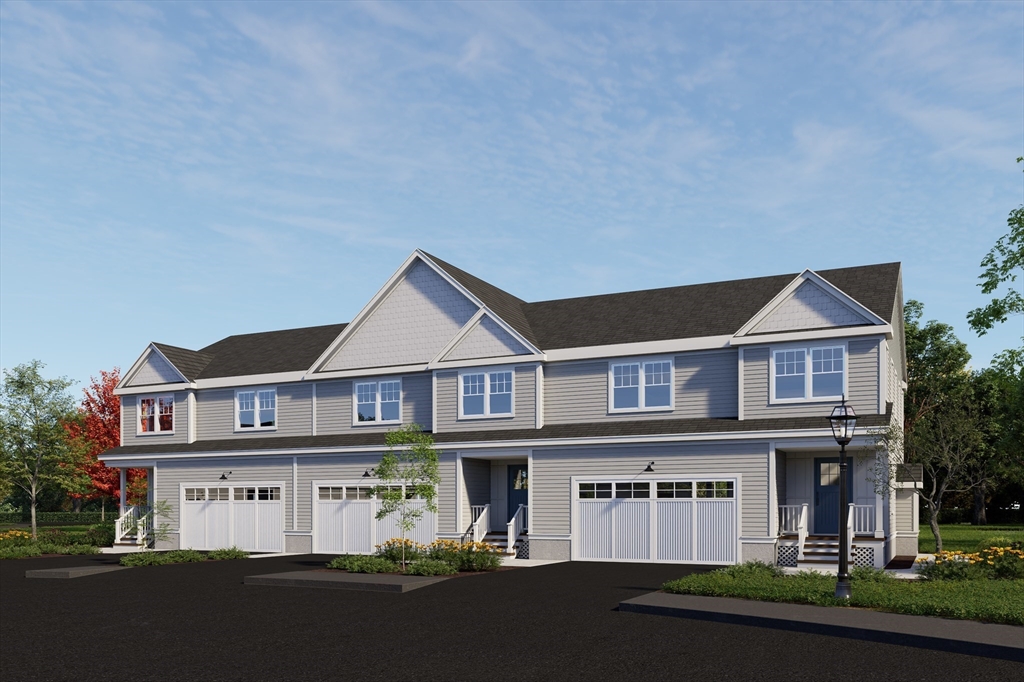 11 Whitman Circle, Unit 11 Bellingham, MA 02019 - Photo 14 of 19 front view of a house with a street