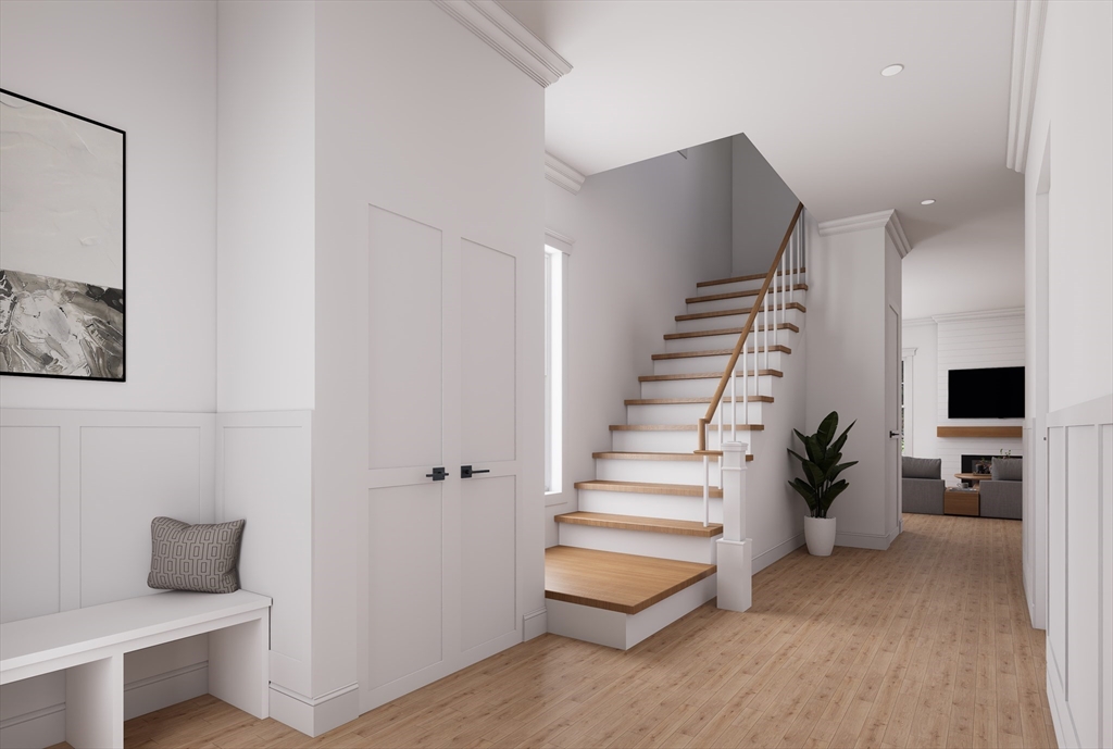 11 Whitman Circle, Unit 11 Bellingham, MA 02019 - Photo 10 of 19 a view of entryway and hall with wooden floor