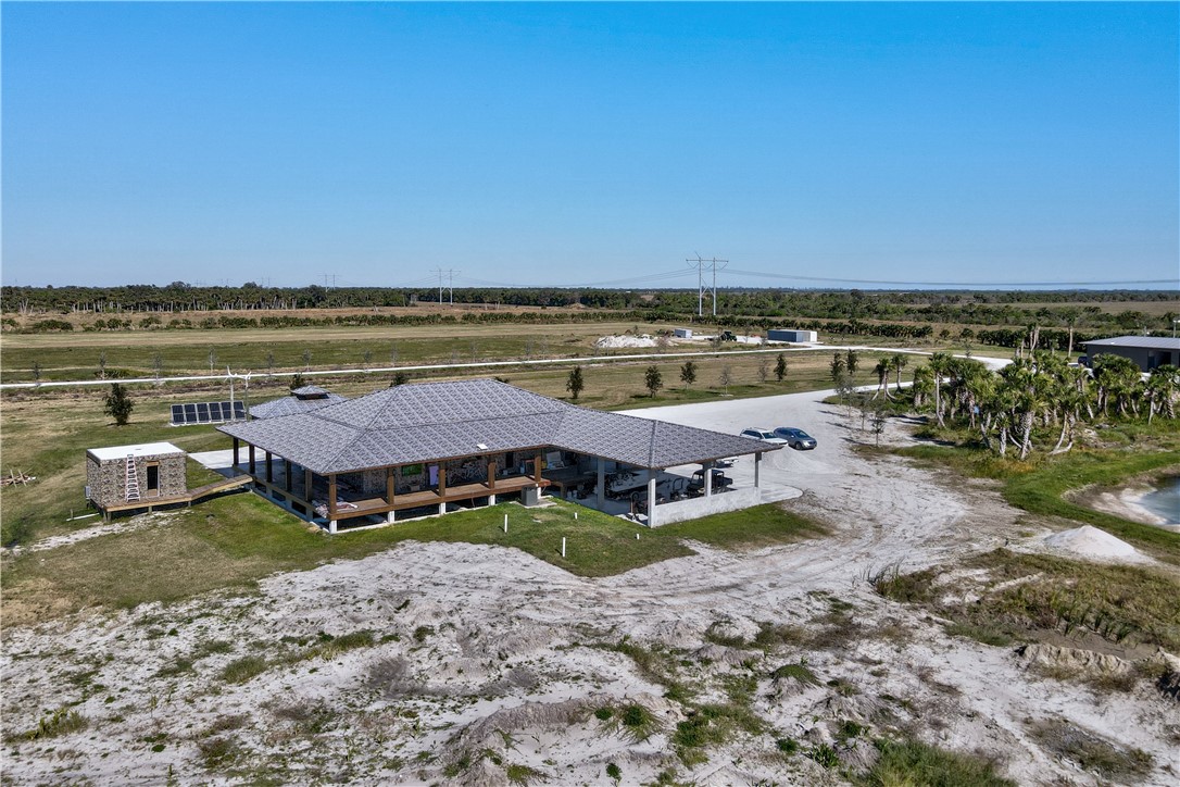 Xxxx Carlton Road Fort Pierce, FL 34945 - Photo 14 of 35 an aerial view of a house with a lake view