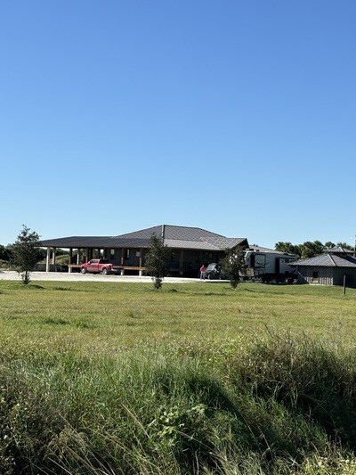 Xxxx Carlton Road Fort Pierce, FL 34945 - Photo 17 of 35 a big yard with lots of green space and deers