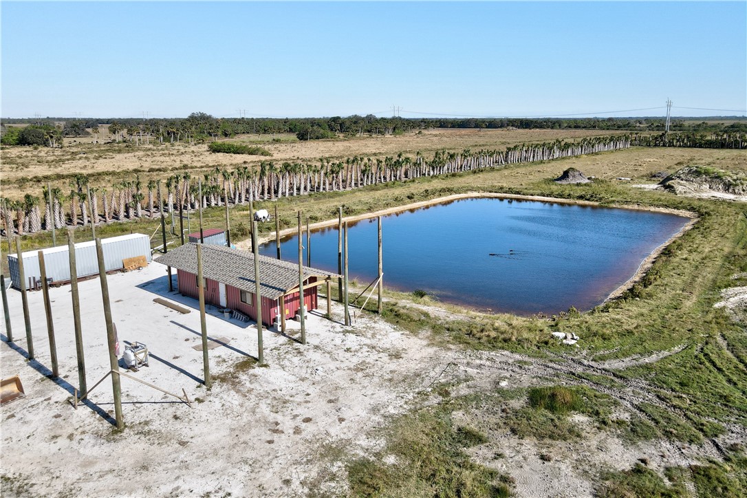 Xxxx Carlton Road Fort Pierce, FL 34945 - Photo 29 of 35 a view of a swimming pool with an ocean view