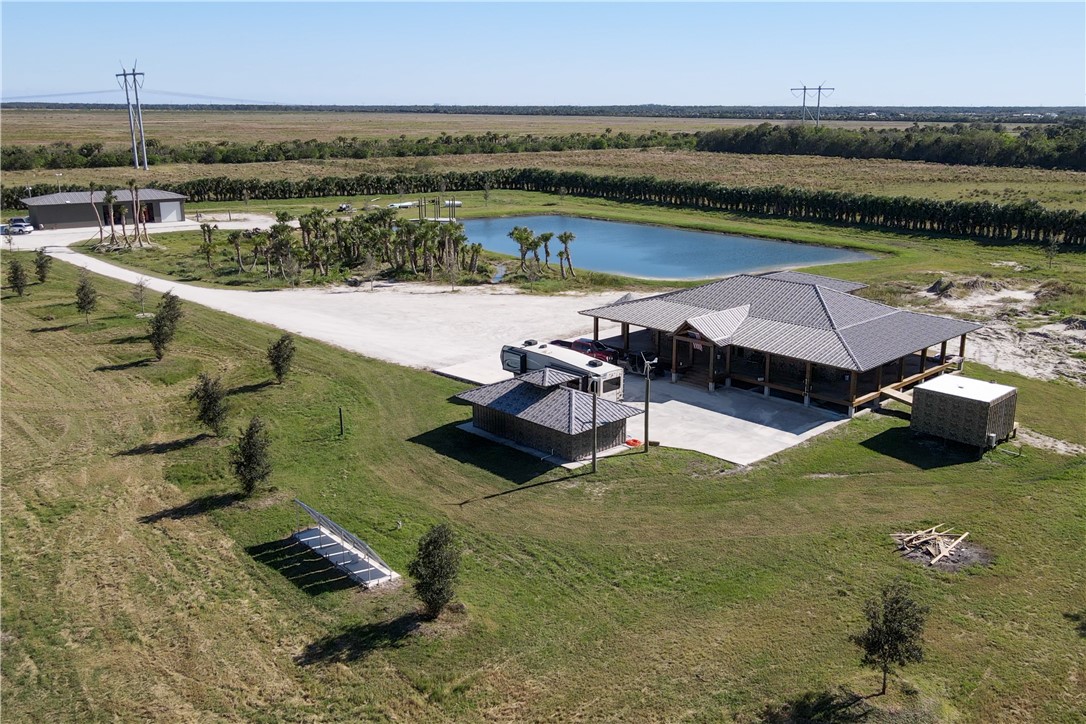 Xxxx Carlton Road Fort Pierce, FL 34945 - Photo 4 of 35 a view of a lake with a terrace