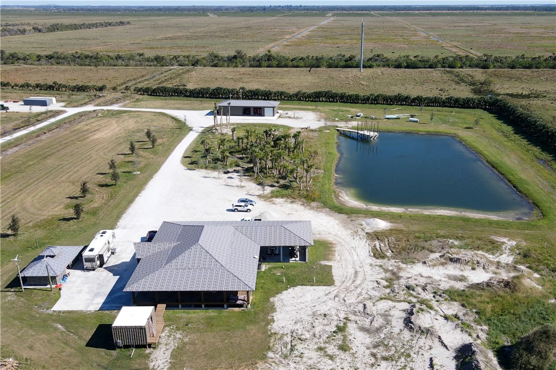 Xxxx Carlton Road Fort Pierce, FL 34945 - Photo 5 of 35 an aerial view of residential houses with outdoor space