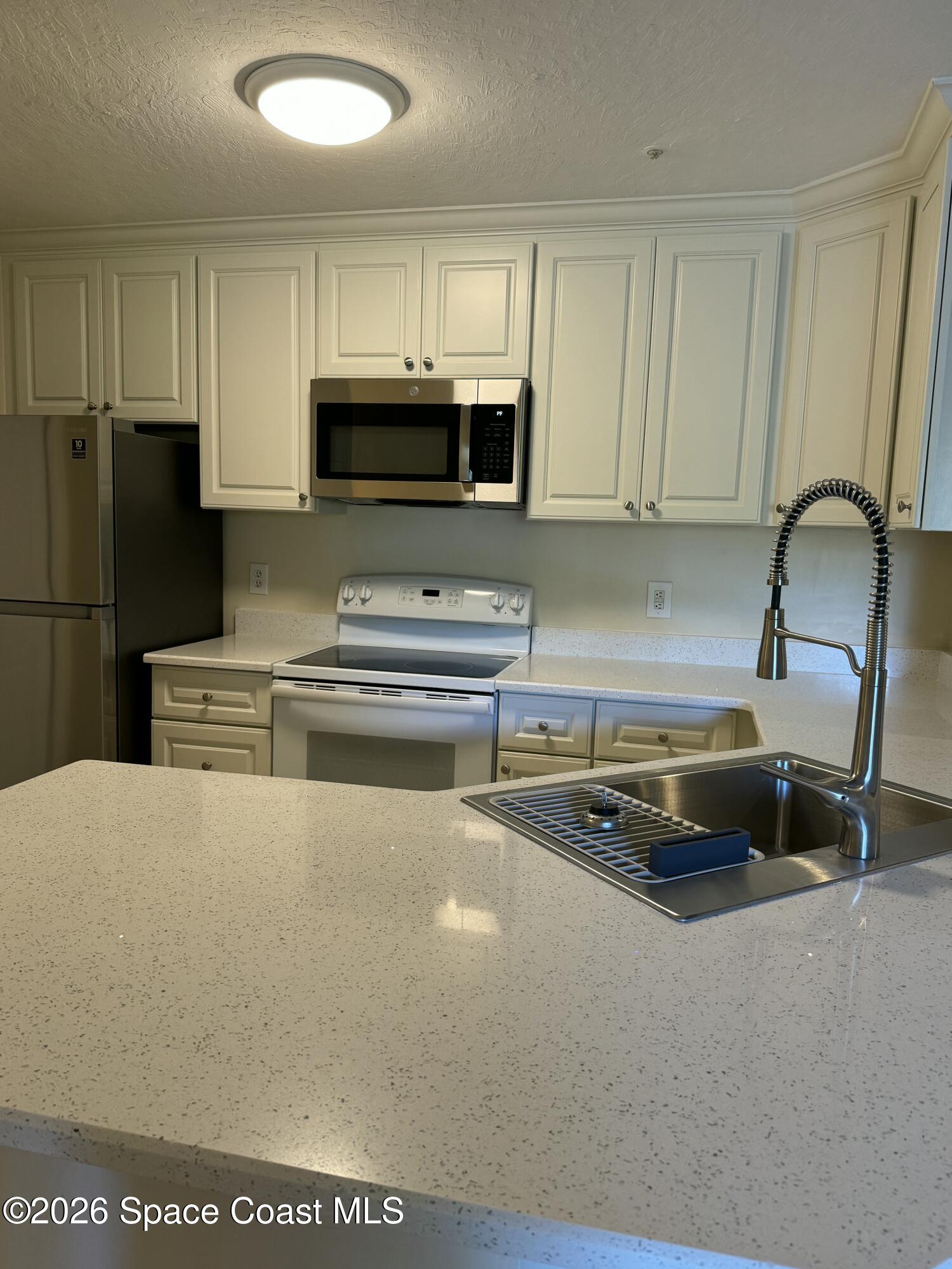 7667 North Wickham Road, Unit 710 Melbourne, FL 32940 - Photo 7 of 14 IMG_7737