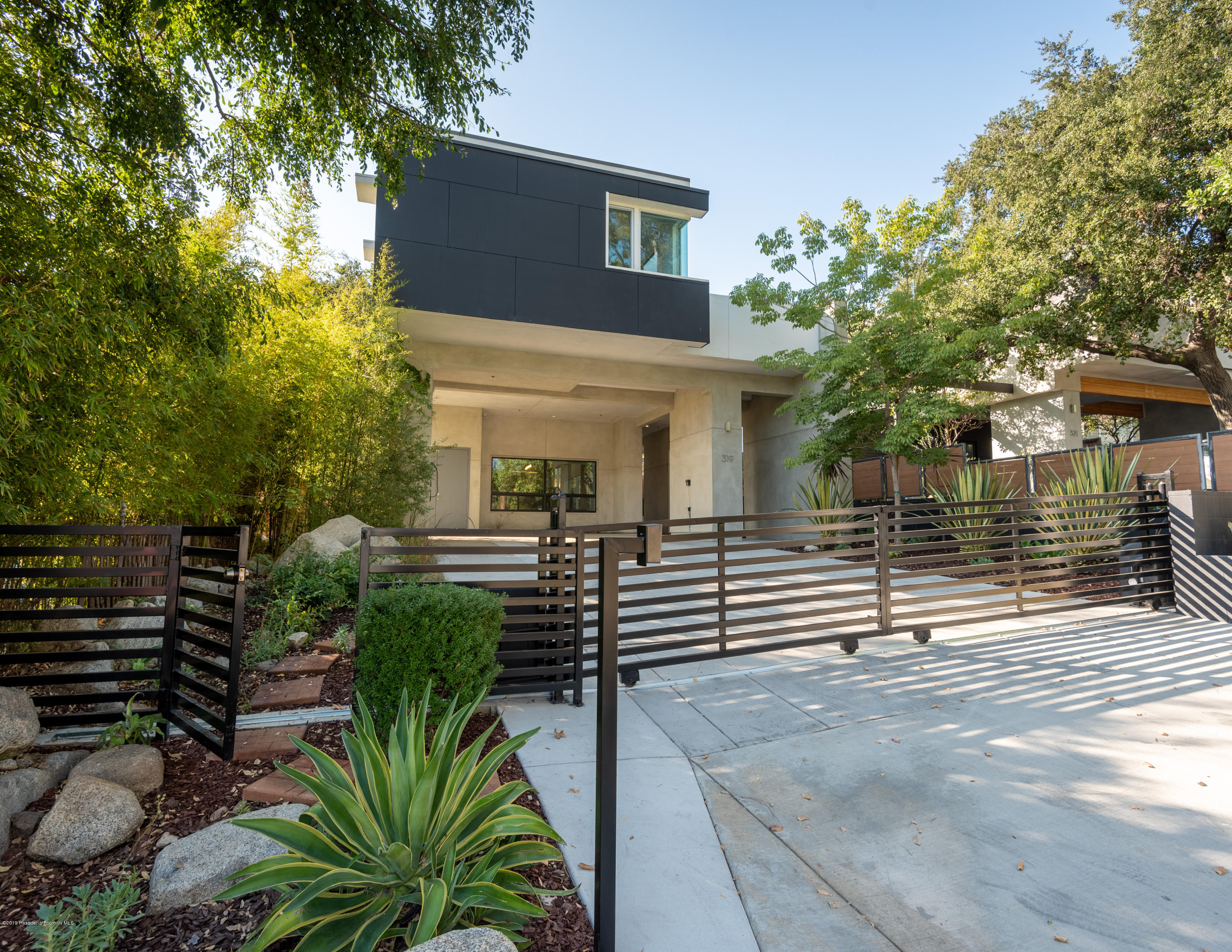 319 Camillo Road Sierra Madre, CA 91024 - Photo 2 of 40 a front view of a house with garden