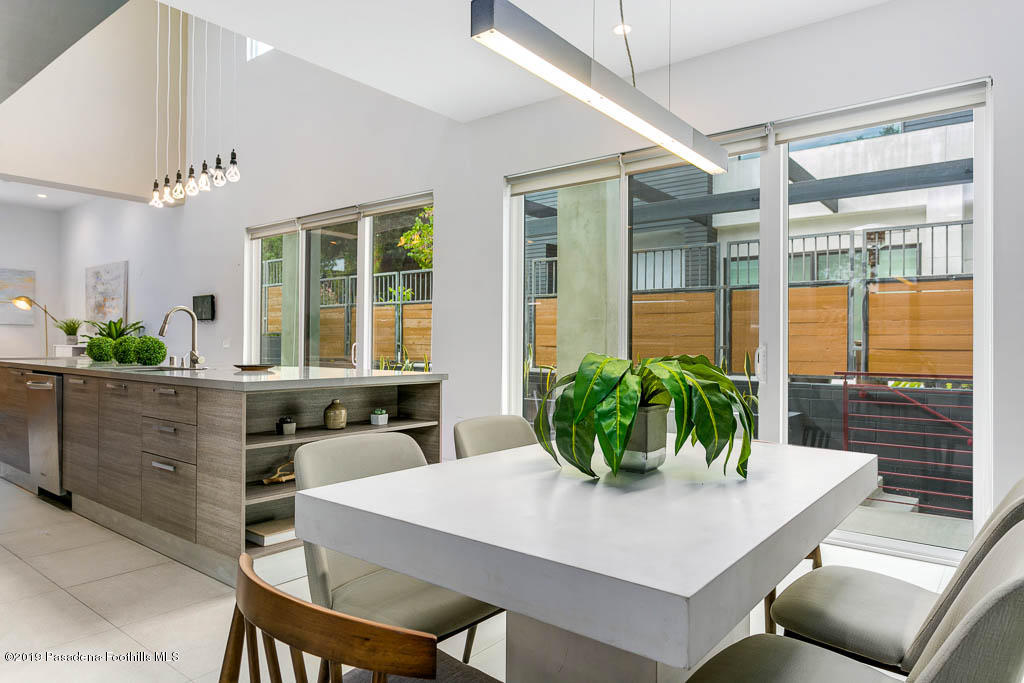 319 Camillo Road Sierra Madre, CA 91024 - Photo 18 of 40 a view of a dining room with furniture window and outside view