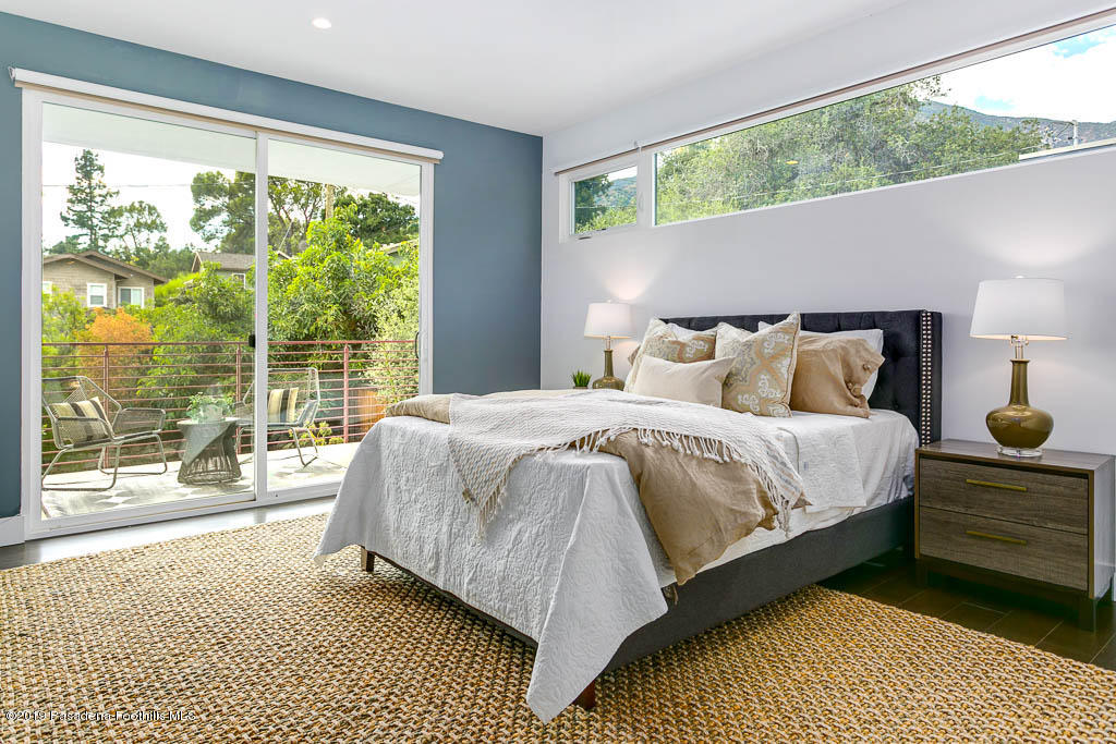 319 Camillo Road Sierra Madre, CA 91024 - Photo 23 of 40 a bedroom with a bed lamp and window