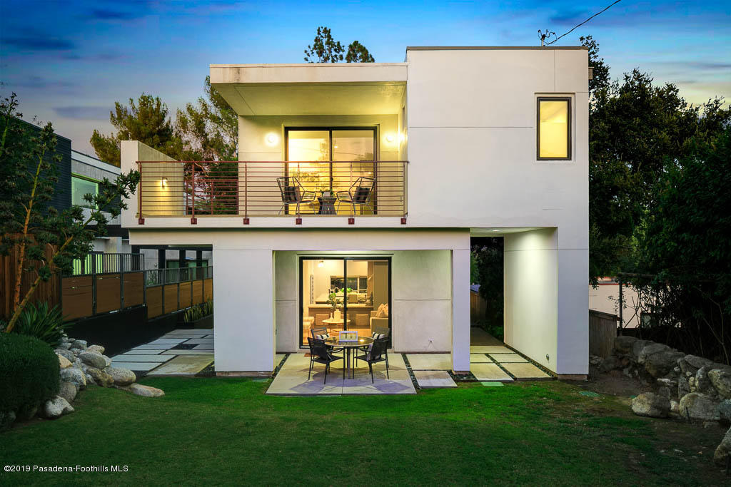 319 Camillo Road Sierra Madre, CA 91024 - Photo 6 of 40 a front view of a house with a yard