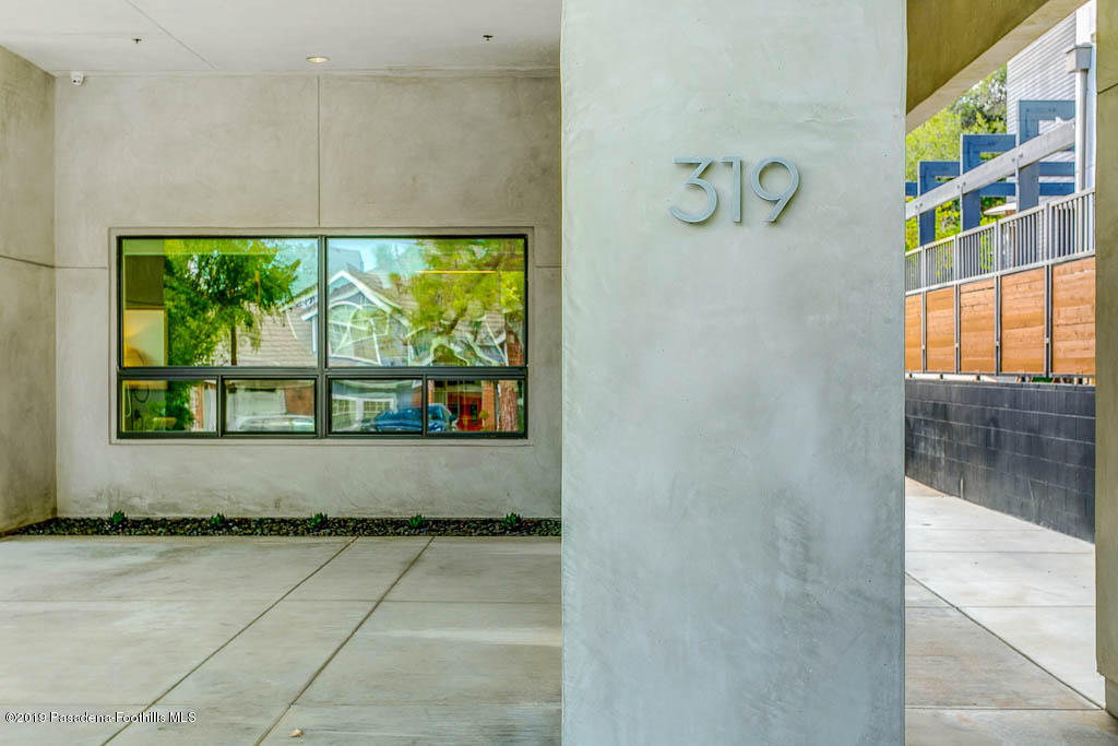 319 Camillo Road Sierra Madre, CA 91024 - Photo 8 of 40 a view of entryway with a garden and seating space