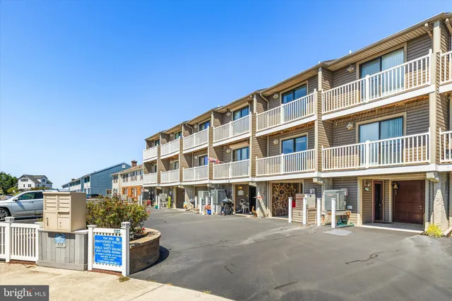 a front view of a building with balcony