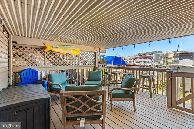 a outdoor dining space with chairs