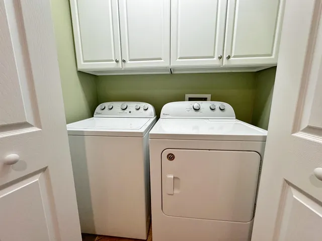 a utility room with dryer and washer