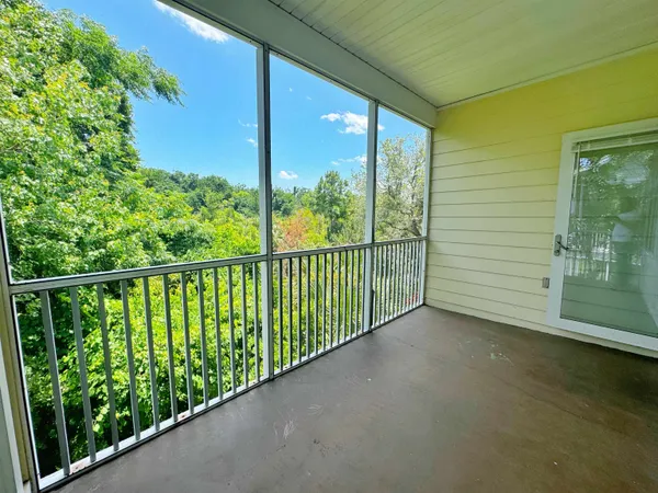 a view of a balcony with lake view