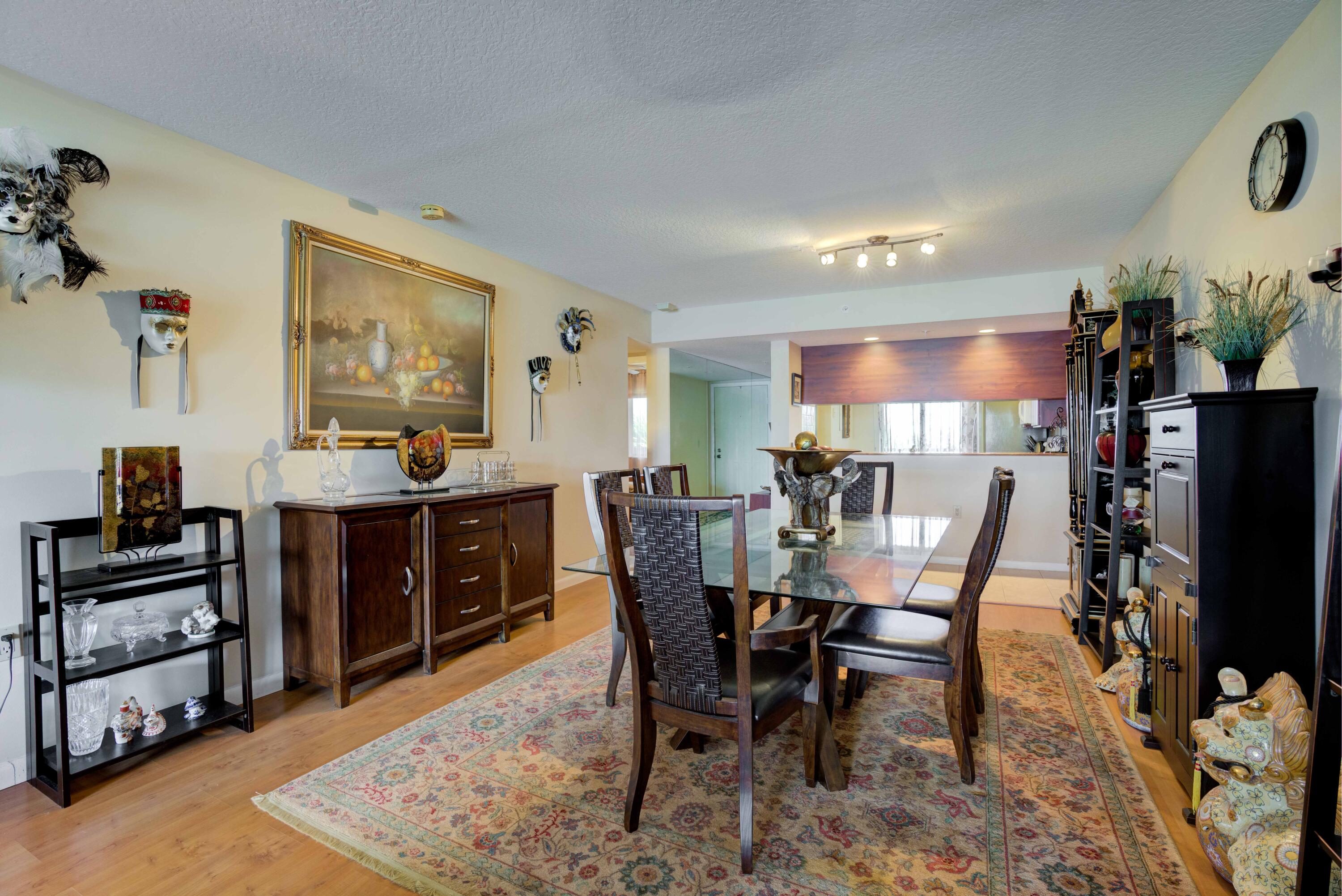 801 Seafarer Circle, Unit 404 Jupiter, FL 33477 - Photo 21 of 34 a view of a dining room with furniture