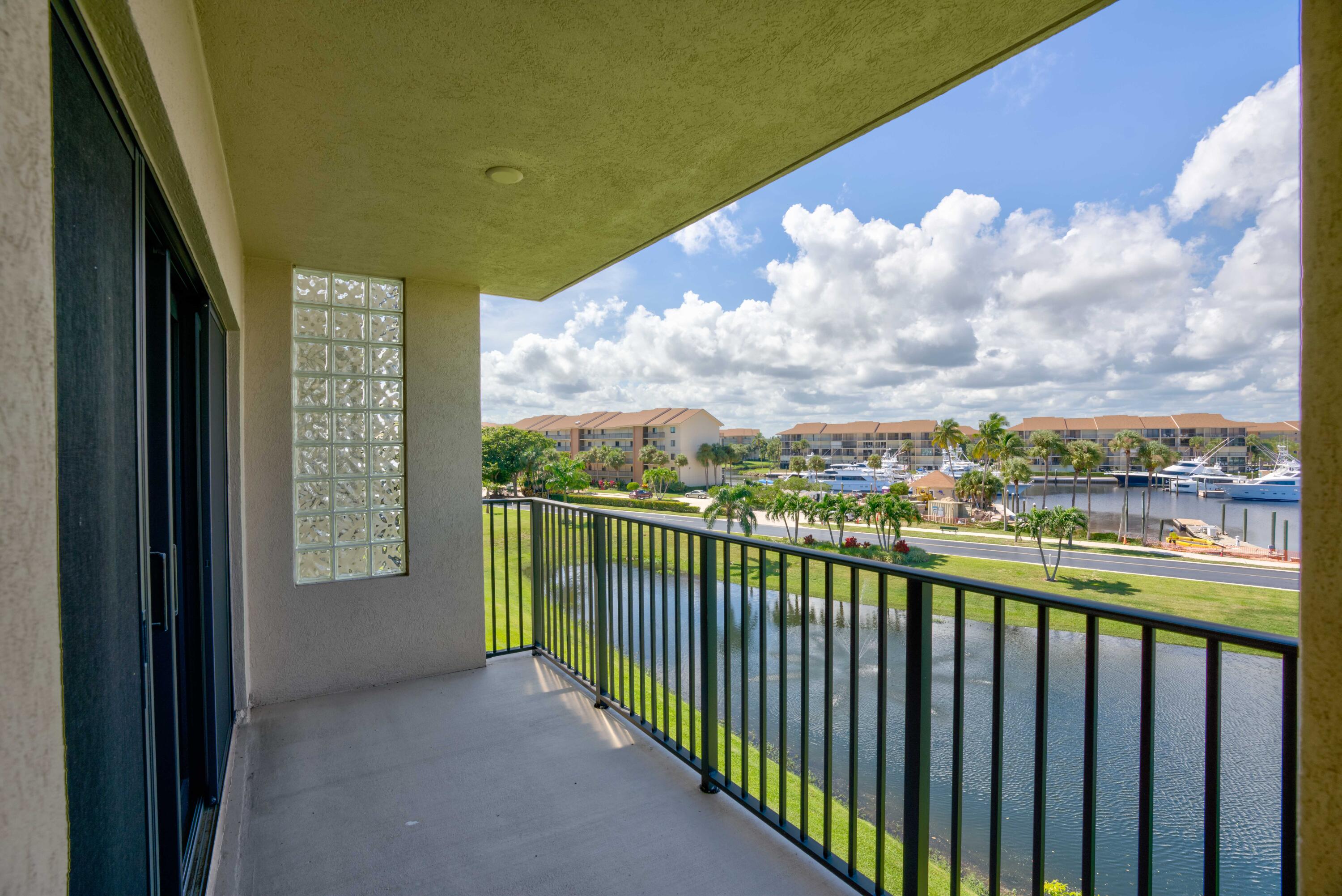 801 Seafarer Circle, Unit 404 Jupiter, FL 33477 - Photo 3 of 34 a city view from a balcony