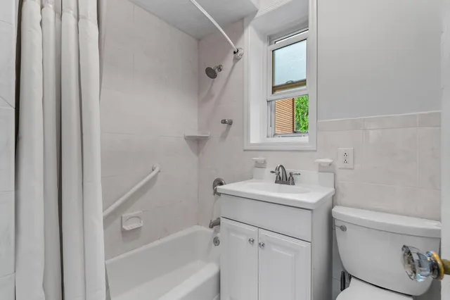 a bathroom with a sink and a bathtub