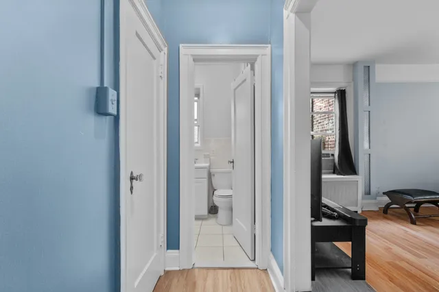 a view of a bedroom from a hallway