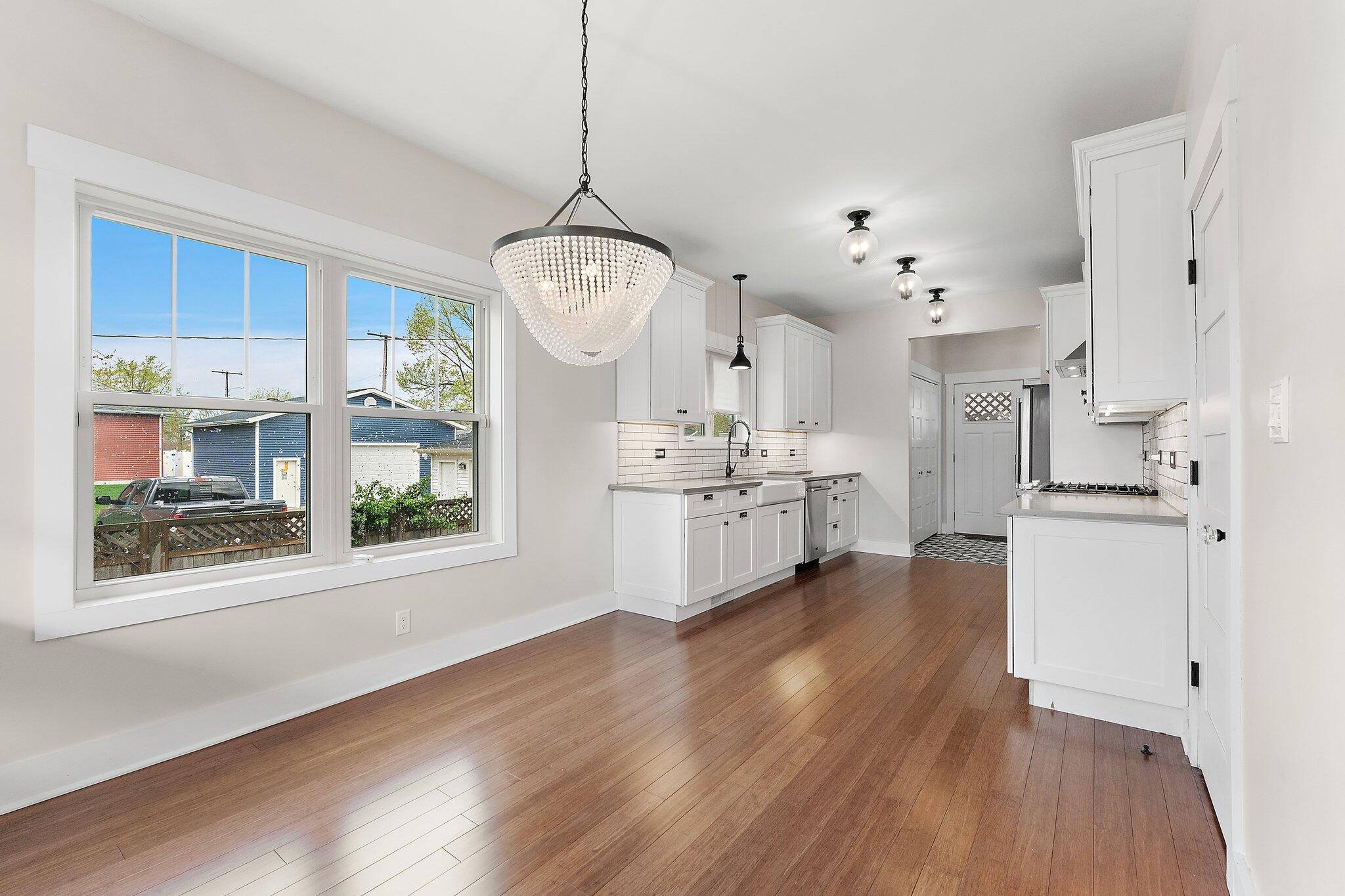 Undisclosed Address Whiting, IN 46394 - Photo 3 of 21 a view of kitchen with sink and wooden floor