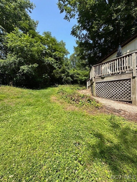 5216 Hemlock Road Quinton, VA 23141 - Photo 11 of 21 View of green lawn featuring a deck