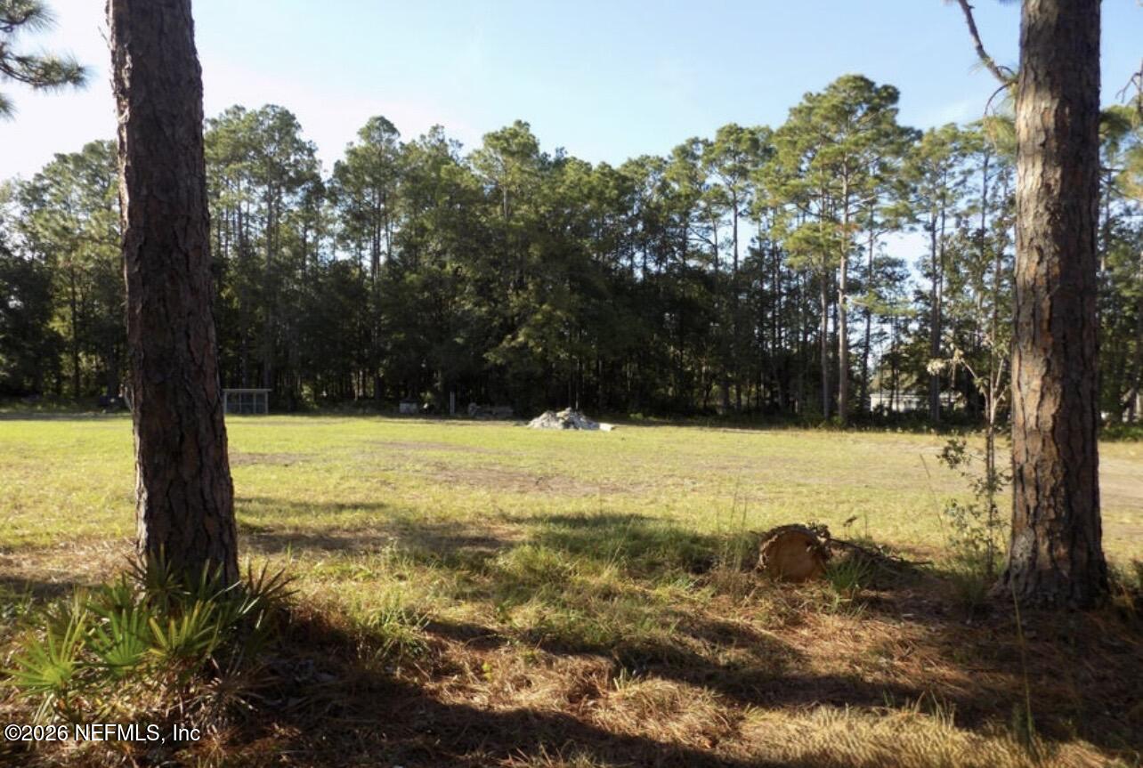 351-335 Otis Road Jacksonville, FL 32220 - Photo 10 of 16 a view of an outdoor space and swimming pool
