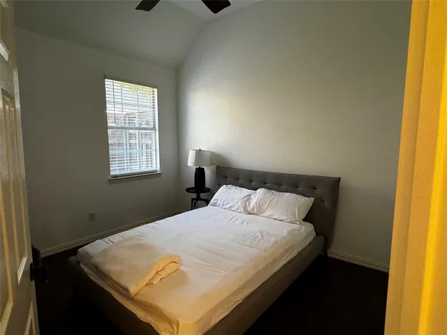 a bathroom with a mirror a sink and a shower